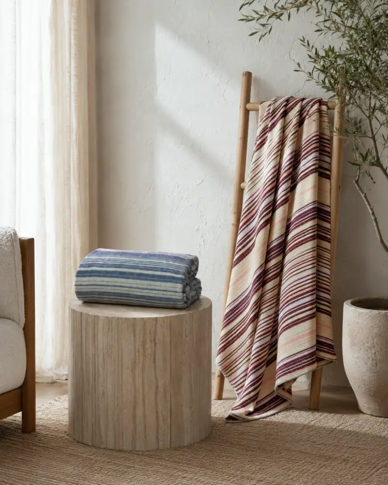 Striped woven blanket, home setting